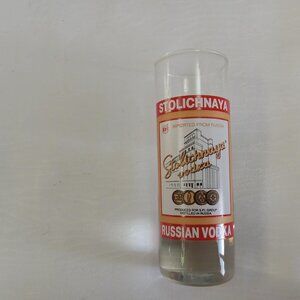 Beautiful vintage small thin glass with a heavy base and Stolichnaya design X 1